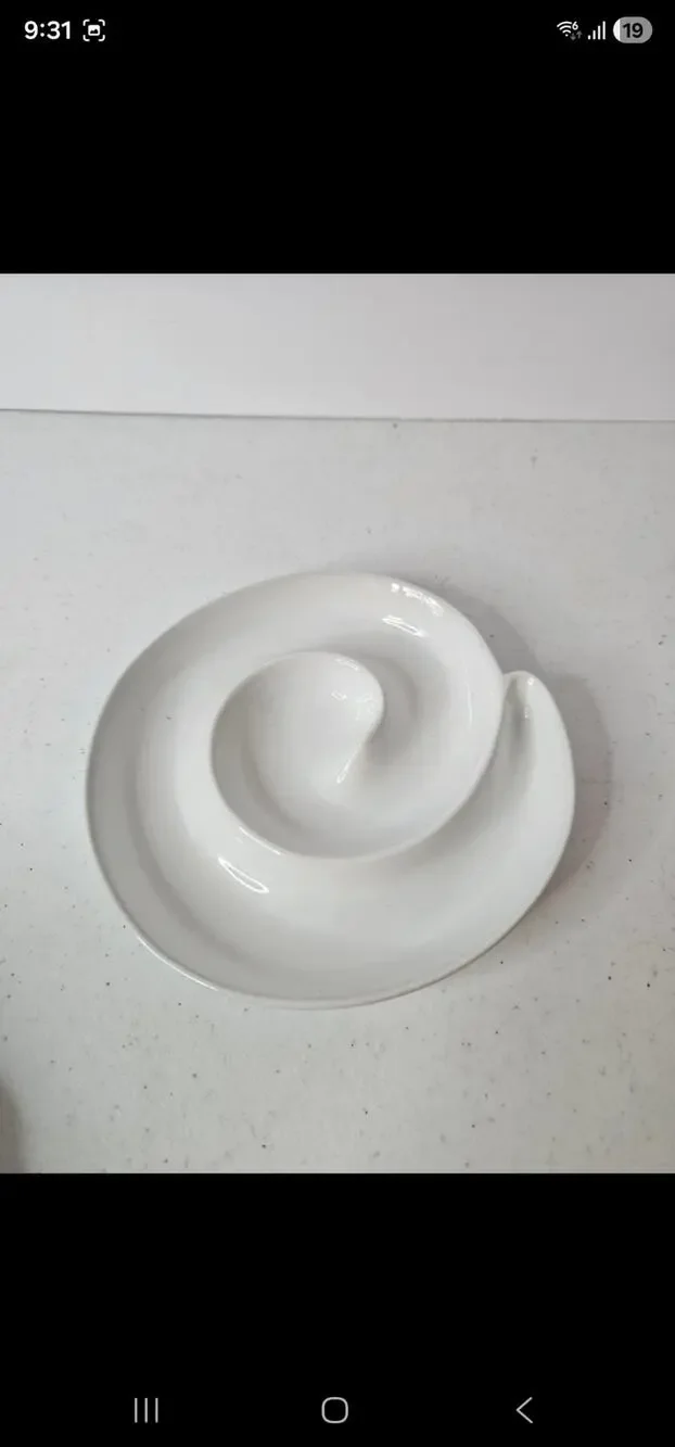 Swirl plate